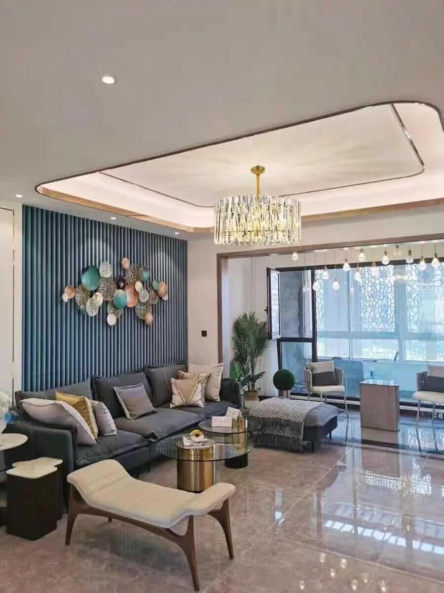 Luxurious living room featuring a crystal transparent LED lamp, modern furniture, and elegant decor.
