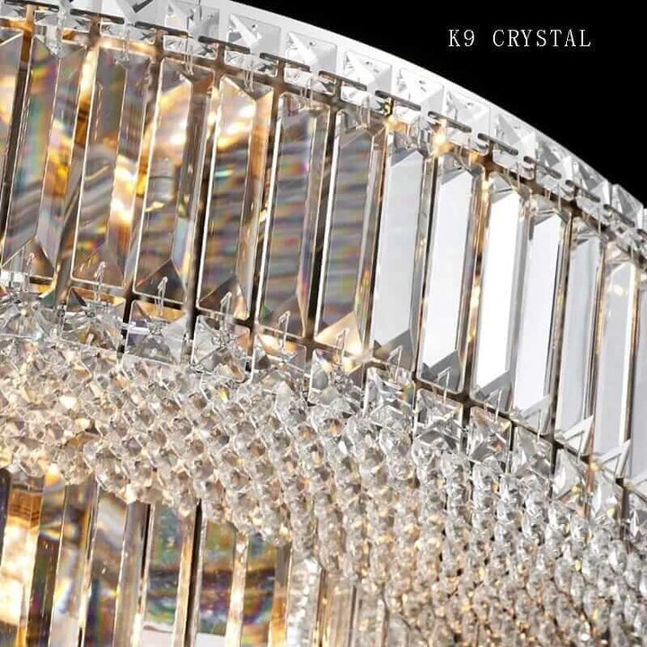 Close-up of K9 crystal details on a luxurious chandelier, showcasing shimmer and elegance.