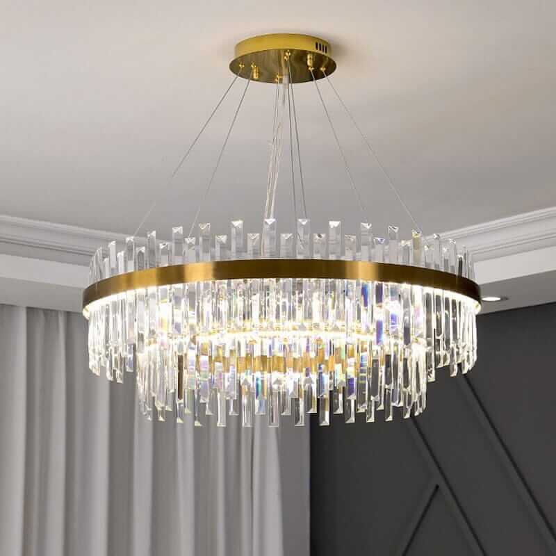 Elegant foyer chandelier featuring crystal accents and gold trim, perfect for adding sophistication to any space.