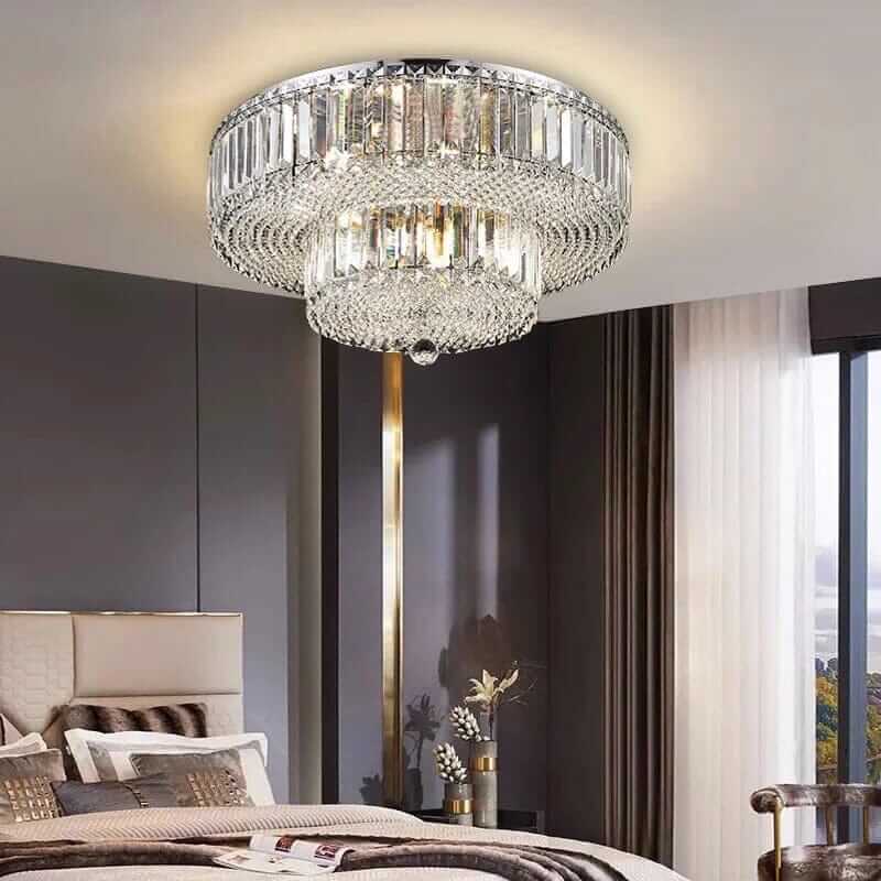 Elegant Alisah Dual Crystal Chandelier illuminating a stylish bedroom with modern decor and warm ambiance.