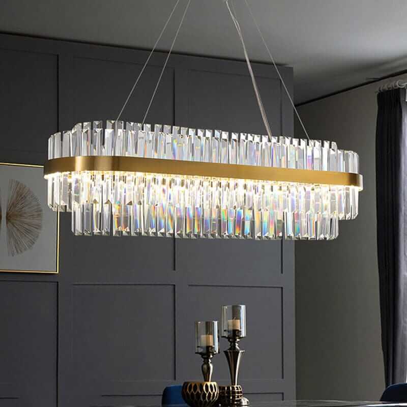 Elegant foyer chandelier with dual-tiered crystal design and gold accents, illuminating modern interior decor.