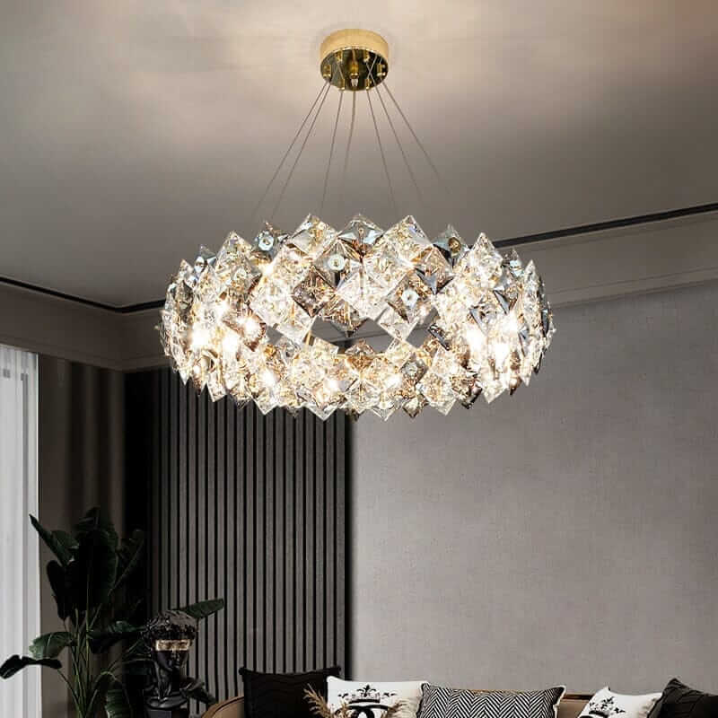 Round chandelier with crystal elements reflecting light, adding sophistication to modern interiors.