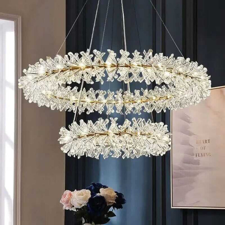 Elegant LED chandelier with flower-shaped crystal design, adding glamour to modern interiors.