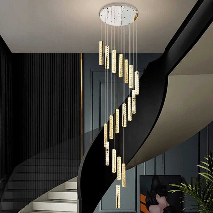 Staircase chandelier with crystal elements illuminating a modern staircase, adding elegance and charm to the decor.