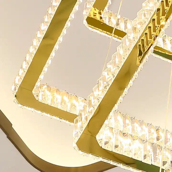 Modern LED chandelier showcasing a sleek square design with crystal accents, perfect for illuminating staircases.