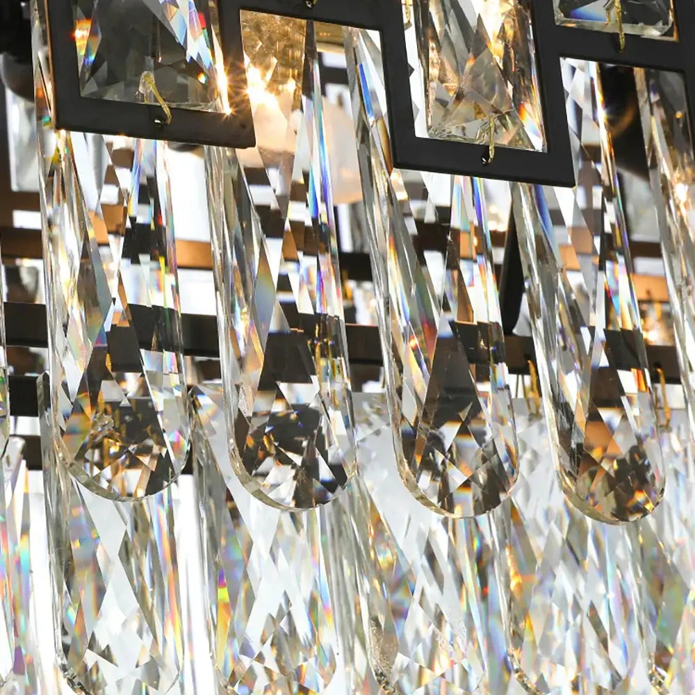 Close-up of luxury crystal drops on a modern black chandelier, showcasing stunning clarity and brilliance.