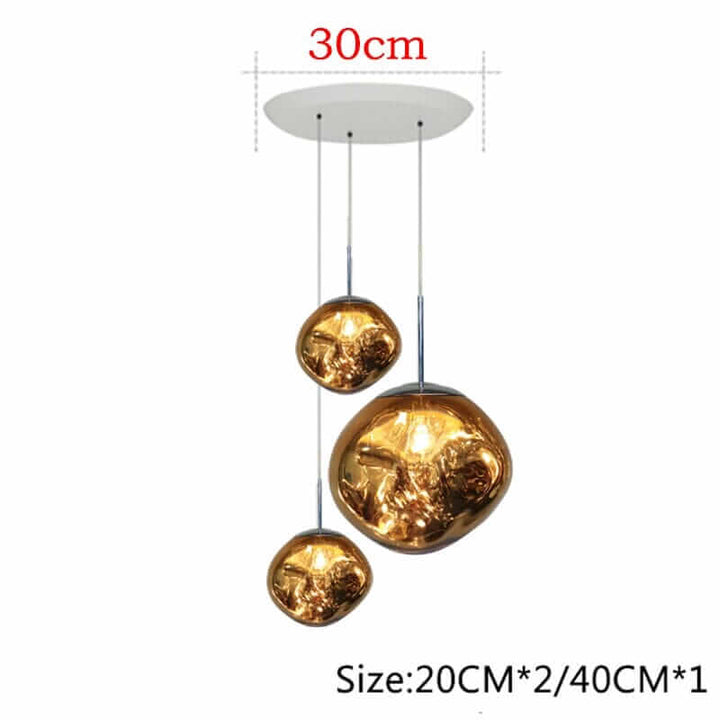 Modern 3-light pendant chandelier with golden lava glass design, perfect for elegant home décor.