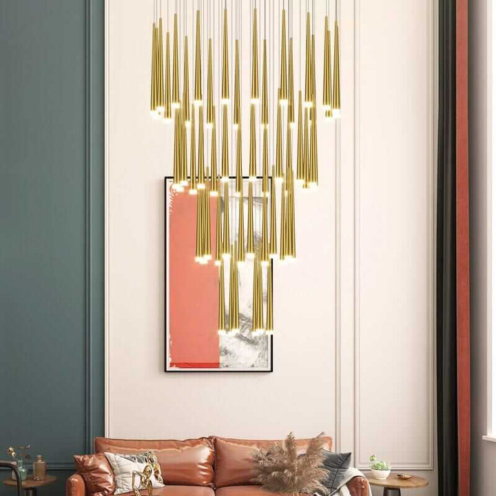 Sleek staircase chandelier hanging in a modern living room, enhancing elegance with contemporary design.