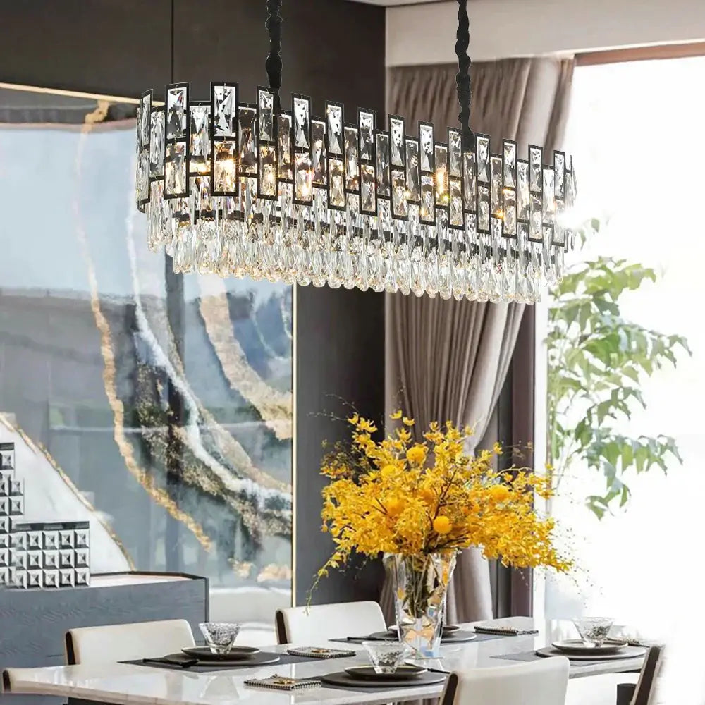 Killara Luxury Crystal Modern Black Chandelier illuminating an elegant dining area with a floral centerpiece.