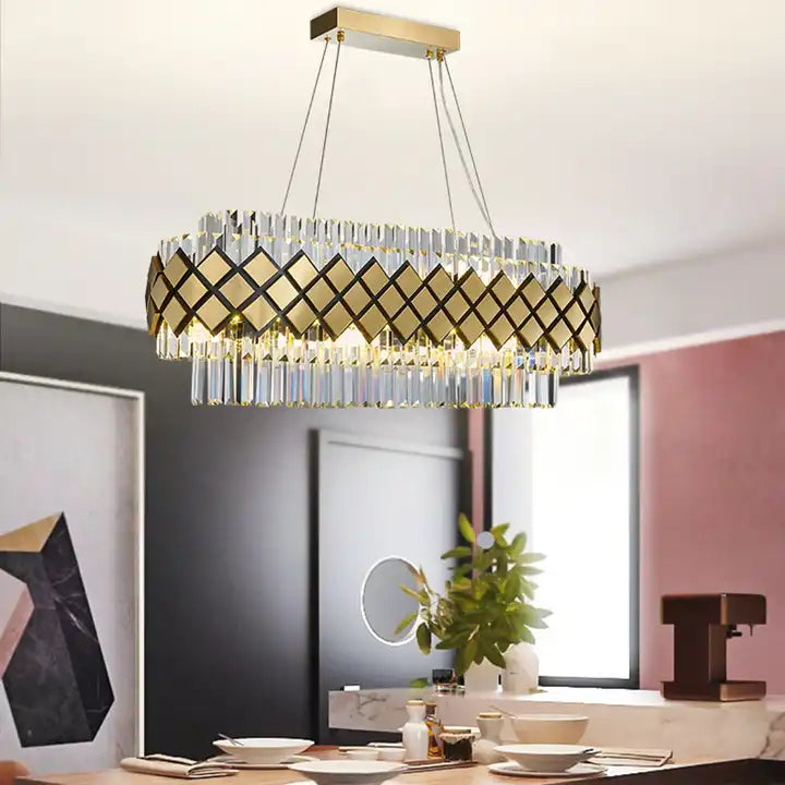 Elegant Bindi Crystal LED Hanging Light illuminating modern dining room with stylish decor and warm ambiance.