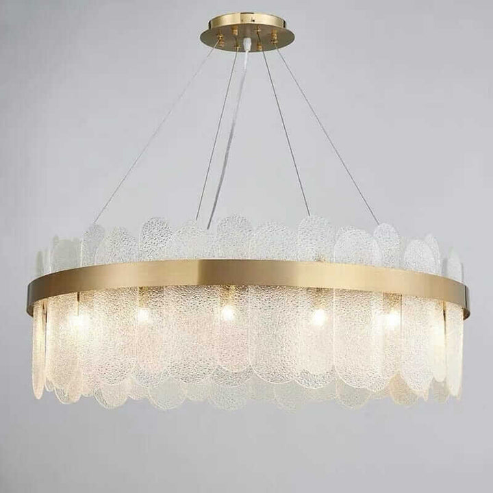 Round chandelier with crystal accents, featuring a gold rim and elegant light design for sophisticated illumination.