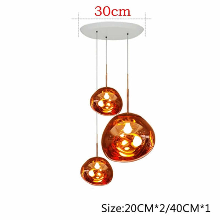 Modern chandelier with three amber glass shades, perfect for elevating home decor and adding a touch of Nordic elegance.