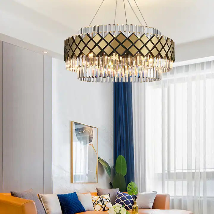Bindi Crystal LED Hanging Light illuminating a modern living room with stylish decor and floor-to-ceiling curtains.