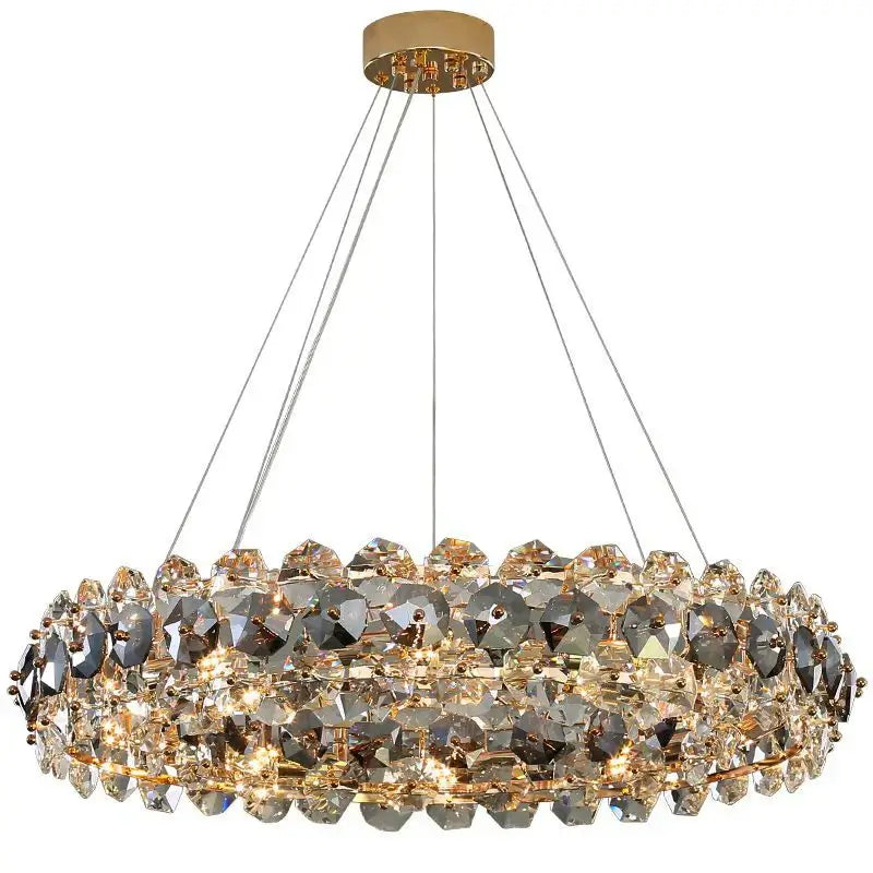 Stunning entryway chandelier with crystal detailing and warm lighting, perfect for adding elegance to any space.