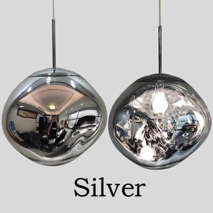Contemporary silver pendant lights showcasing elegant, reflective design for modern interiors.