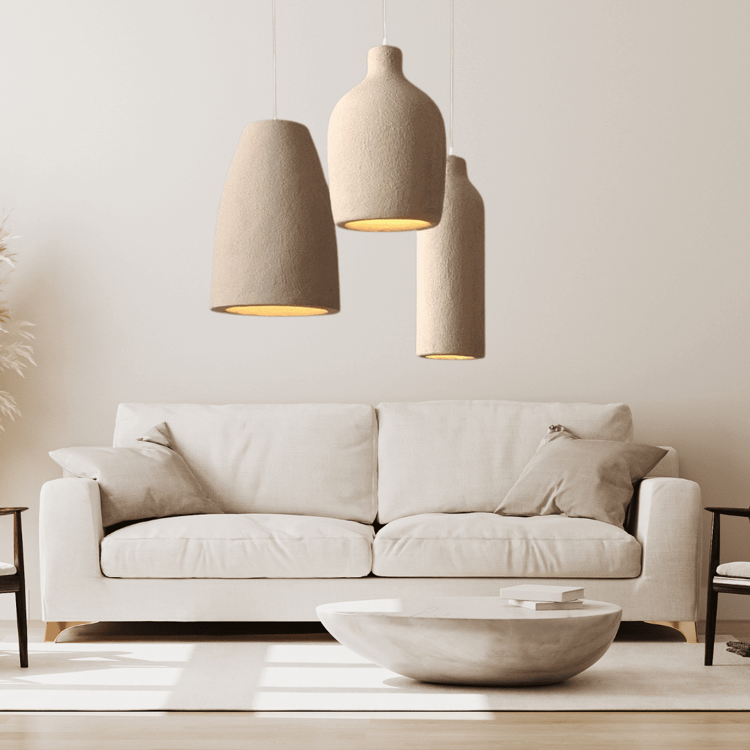 Wabi Sabi Pendant Light above a stylish couch in a modern living room, creating a warm and inviting atmosphere.