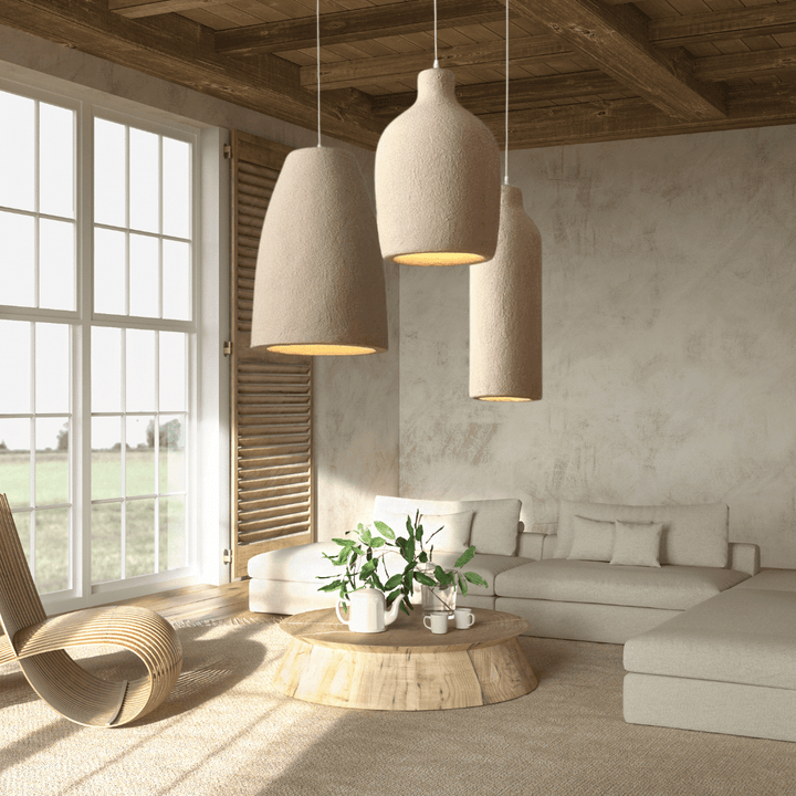 Wabi Sabi pendant lights hanging in a cozy living room, enhancing the cultural art aesthetic with soft natural light.