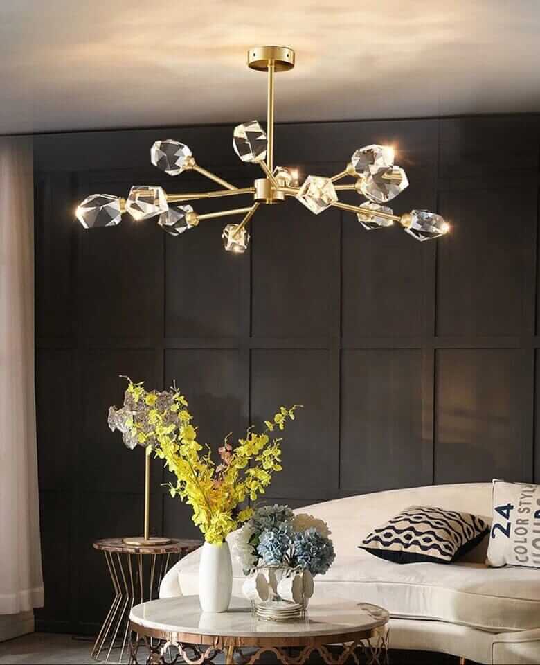 Elegant Sputnik chandelier with crystal accents illuminating a stylish living space.