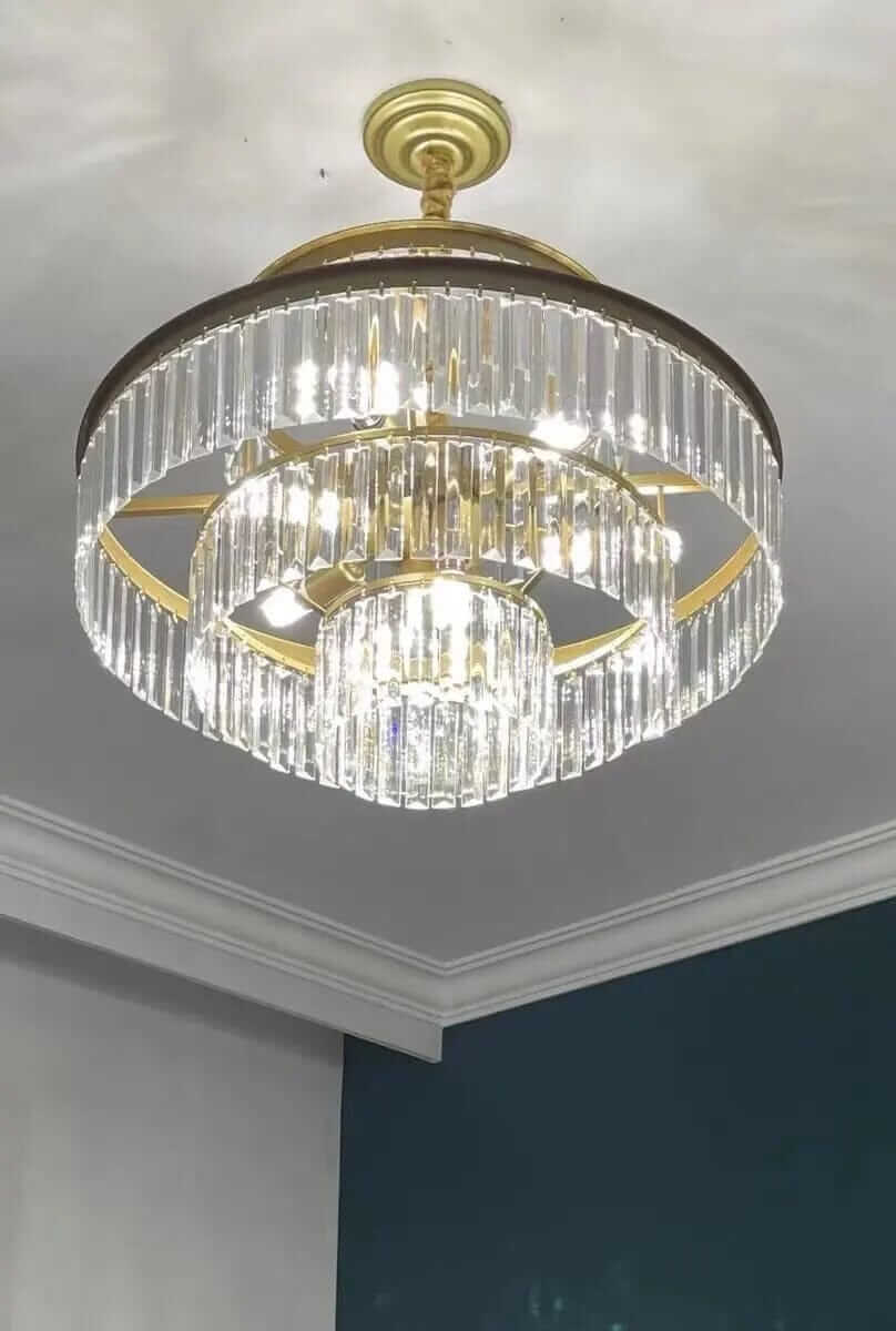 Badra Gemima Round Golden Crystal Chandelier showcasing its elegant design and sparkling crystals for luxurious lighting.