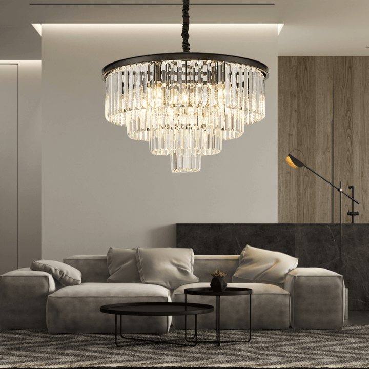 Luxury Gemima Round Golden Crystal Chandelier illuminating a stylish modern living room with elegant decor.