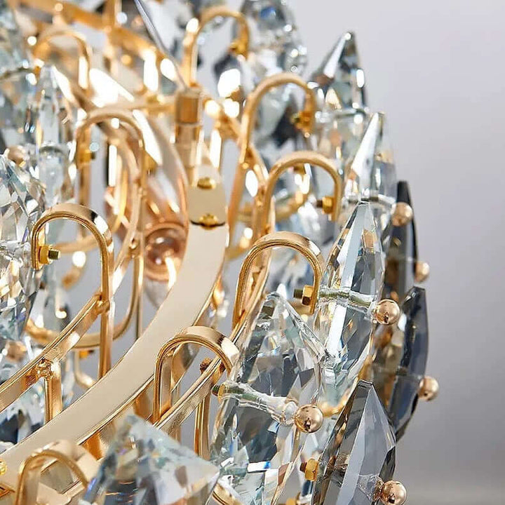 Close-up of the Round Chandelier showcasing  elements and ornate vacuum plated metal frame.