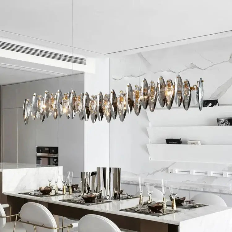Allora Creative Art Long Restaurant Crystal Chandelier illuminating a modern dining space with elegant decor.