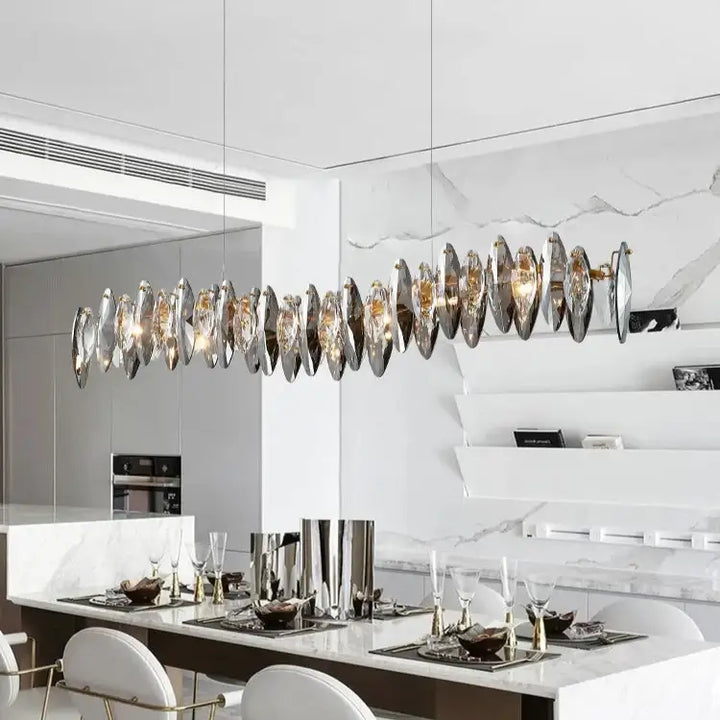 Allora Creative Art Long Restaurant Crystal Chandelier illuminating a modern dining space with elegant decor.