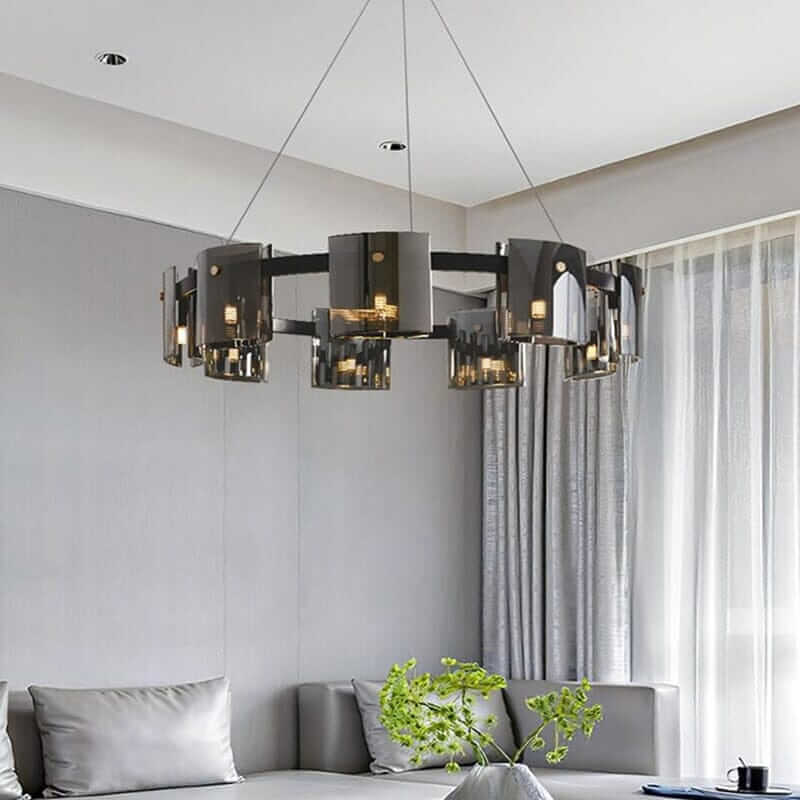 Stylish LED chandelier hanging in a modern living room, providing warm and inviting illumination.