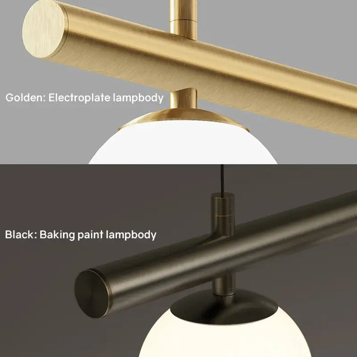 Close-up of black and gold chandelier showing electroplate and baked paint finishes.