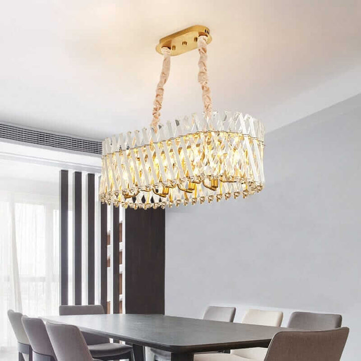 Luxurious crystal LED lamp hanging from the ceiling in a modern dining room, illuminating the elegant space.