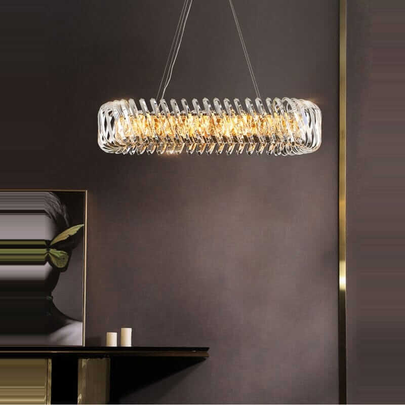 Sleek entryway chandelier with a gold finish, providing elegant lighting and ambiance in a modern setting.