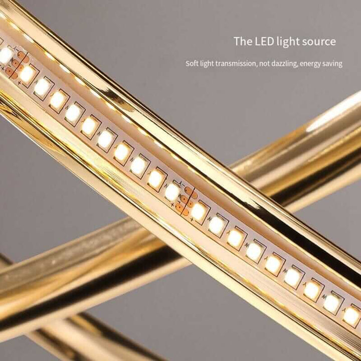 Close-up of LED light source on gold chandelier, showcasing soft light transmission and energy-saving design.