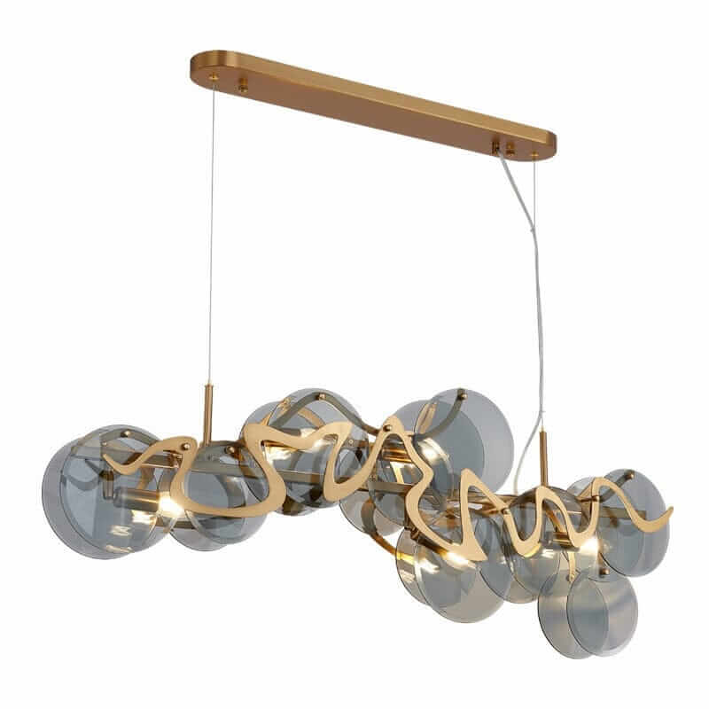 Gold chandelier pendant light with glass globes, perfect for modern home decor.
