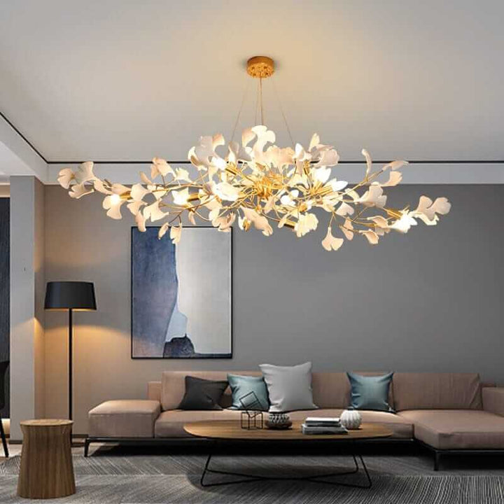 Elegant floral chandelier illuminating a modern living room with soft, inviting glow for a tranquil ambiance.