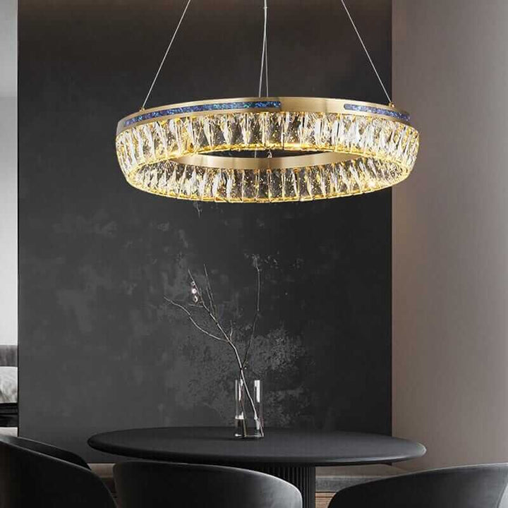 Luxurious foyer chandelier with K9 crystal accents and modern LED lighting in an elegant interior.