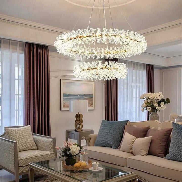 Elegant LED chandelier with crystal flowers illuminating a stylish living room and enhancing interior decor.