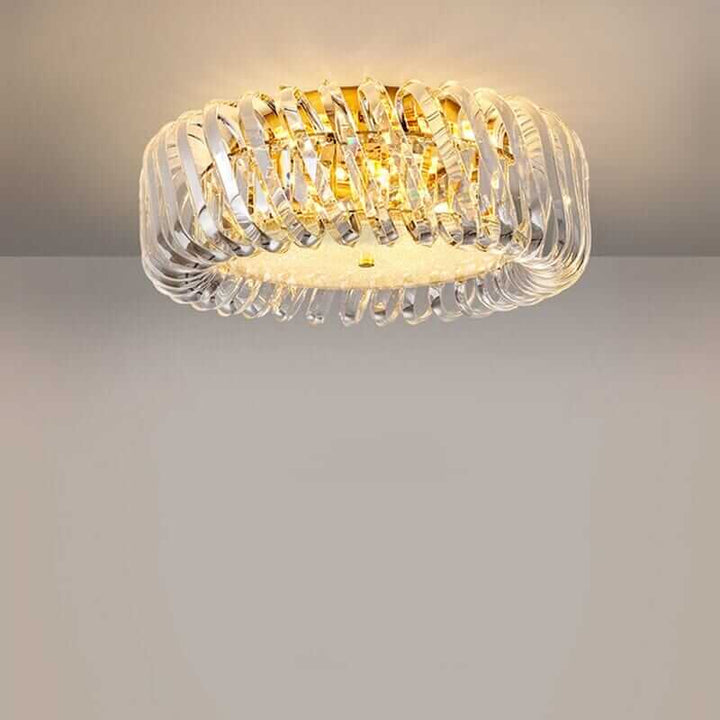 Stylish round entryway chandelier with a gold finish and crystal design, enhancing modern ambiance.