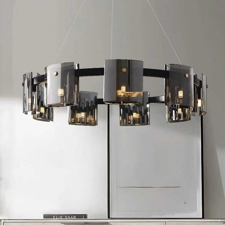 Elegant LED chandelier with glass shades, illuminating a modern interior with a warm glow.