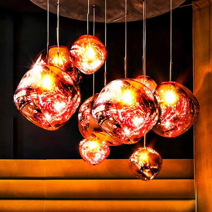 Foyer chandelier with lava-inspired glass design, exuding Nordic elegance and sophistication in home decor.