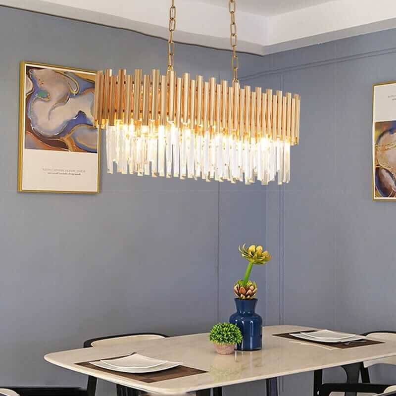 Contemporary wood and glass chandelier illuminating a modern dining room with elegant decor.
