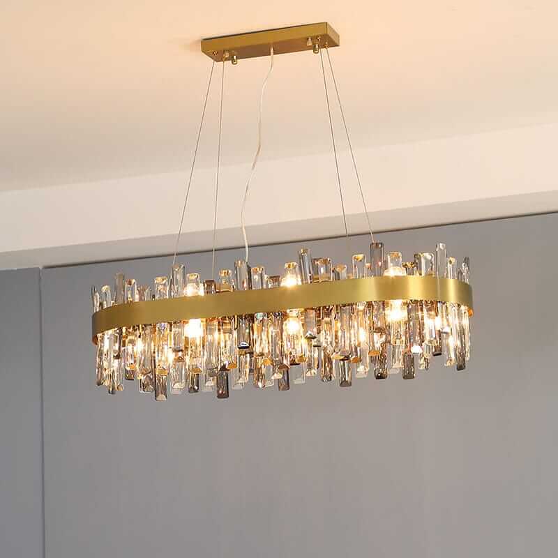 Gold crystal chandelier with elegant design, perfect for illuminating any room with luxury and style.