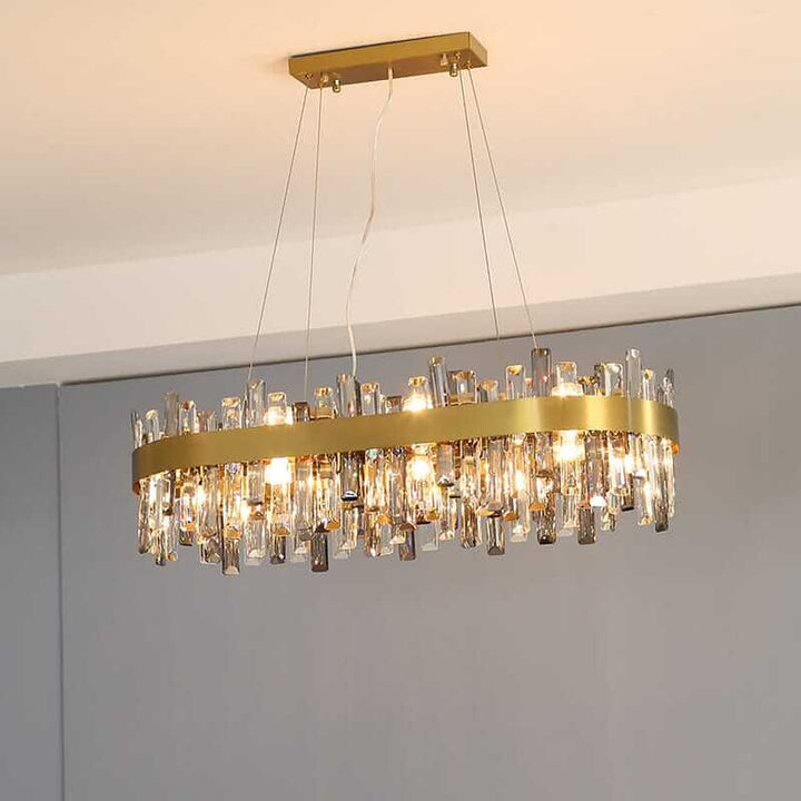 Gold crystal chandelier with elegant design, perfect for illuminating any room with luxury and style.
