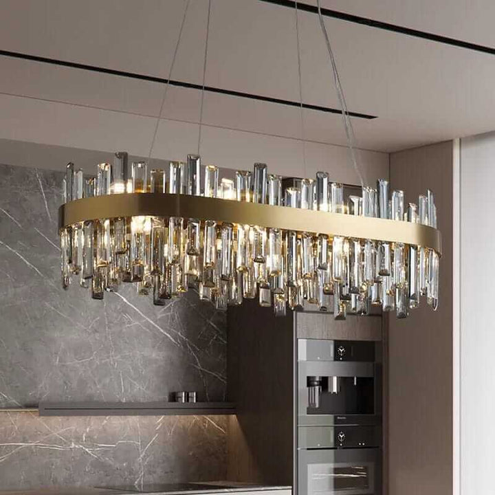 Gold crystal chandelier with multiple arms, designed for luxury and elegance in modern home decor.