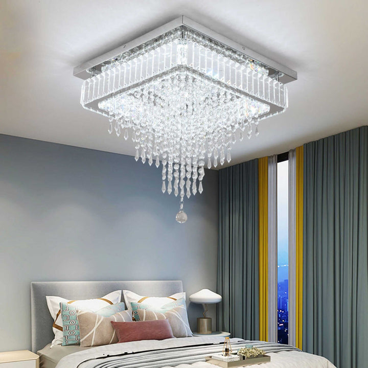 Freddie Square Crystal Ceiling Chandelier illuminating a modern bedroom with elegant design and sparkling details.