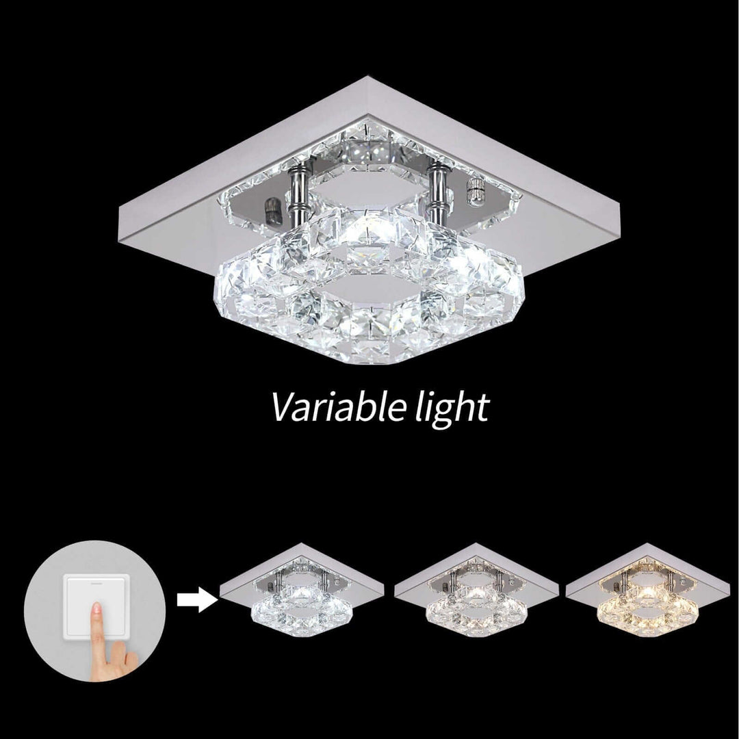 Small crystal chandelier with variable light settings, showcasing modern design and elegance.