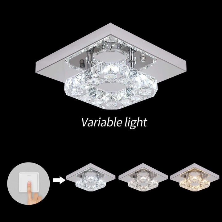Small crystal chandelier with variable light settings, showcasing modern design and elegance.