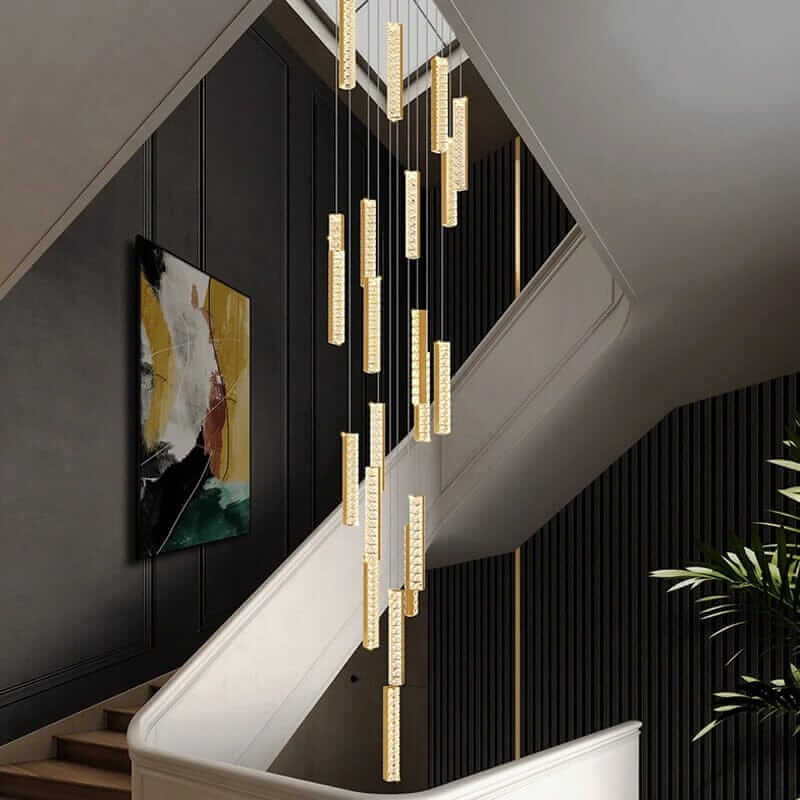 Modern LED crystal chandelier illuminating a staircase with stylish pendant designs.