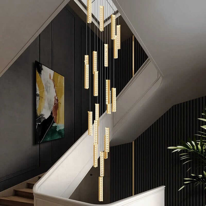 Modern LED crystal chandelier illuminating a staircase with stylish pendant designs.