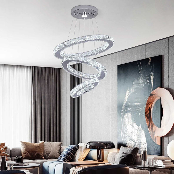 Stylish entryway chandelier with three rings, brightened living room, enhancing modern home decor.