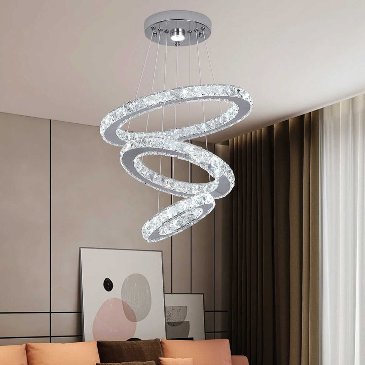 Elegant spiral entryway chandelier with crystal accents, enhancing home décor with sophistication and style.